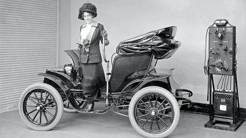 electric-vehicle-woman-charging.jpeg