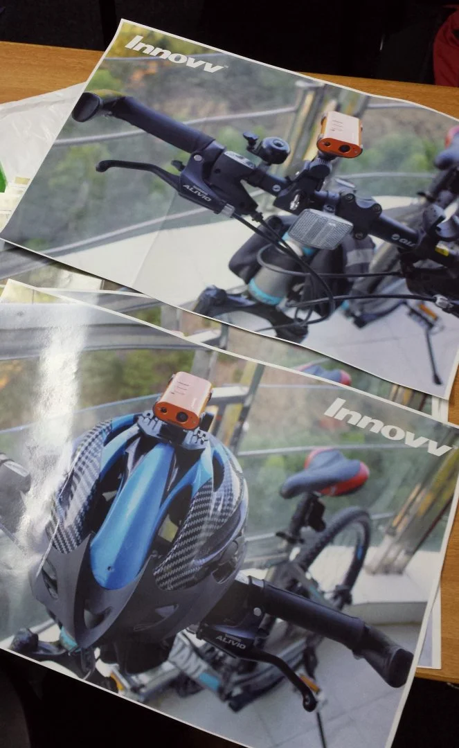 INNOVV poster on bike.webp