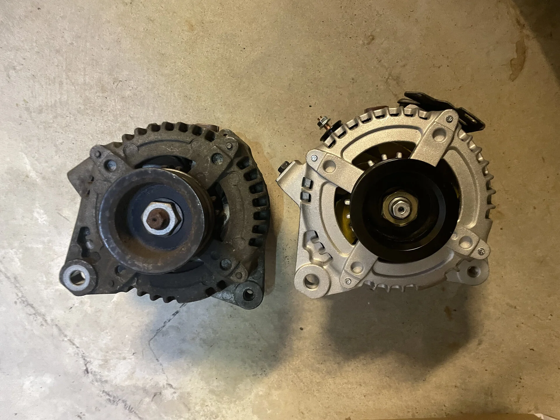 Old-alternator-with-new-high-output-alternator.webp