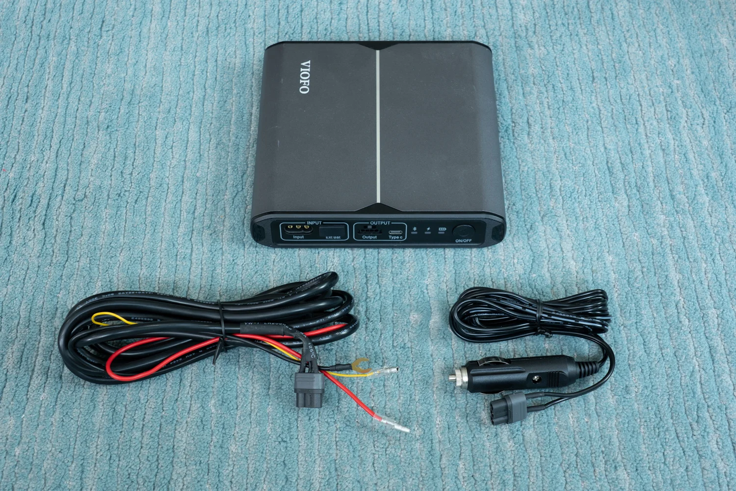 Viofo BP100 with input charge cables.webp