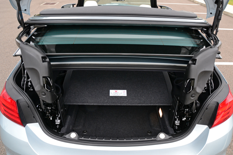 2015-bmw-m4-convertible-trunk-top-down-power-lift.jpg